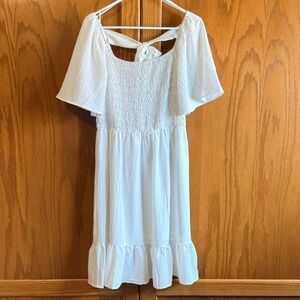 Bibi Smocked Bodice Dress NWOT Medium White Excellent Tie Back Ruffle Hem.